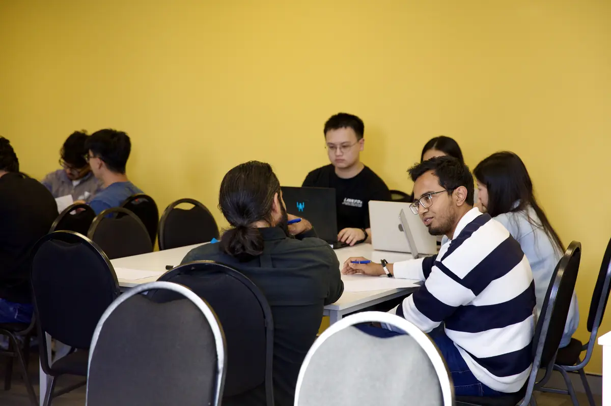 College students in a group discussion during a money skills workshop
